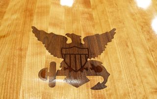 Custom Walnut inlay with dyed resin set into an Edge Grain Cherry table top.