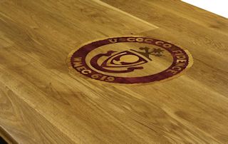 Custom Purpleheart, Walnut and White Oak inlay set into a Face Grain White Oak table top.