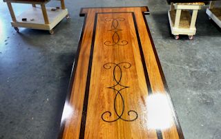 Custom Wenge inlay and Wenge bands set into a Face Grain Jatoba Island Top.