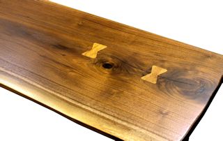 Pecan butterfly inlays in Texas Walnut table top.