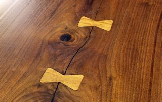 Pecan butterfly inlays in Texas Walnut table top.