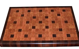 End Grain Lyptus Island Top with Walnut accents and a Walnut border.