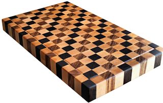 End Grain Hard Maple chopping block with Wenge and Zebrawood patterned accents.