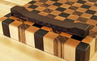 End Grain Hard Maple chopping block with Wenge and Zebrawood patterned accents.