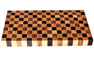 End Grain Hard Maple chopping block with Wenge and Zebrawood patterned accents.