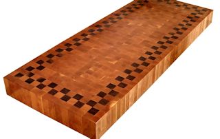End Grain Cherry Island Top with a patterned Walnut Accent Band.