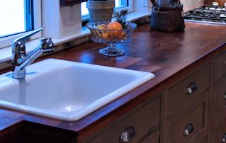 Edge Grain Mesquite Countertop with drop in sink and Waterlox finish