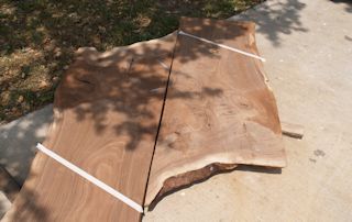 Walnut slab pieces used to make a smaller wood island top.