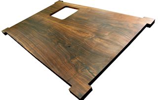 Custom wood island top made from two book-matched walnut slabs.  Rectangular shape with dog-ear corners.  Finished with tung-oil/citrus solvent.