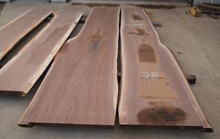Two walnut slabs from the same tree.  These slabs were used to create a kitchen island top with a wane edge on one side.