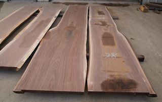 Two walnut slabs from the same tree. These slabs were used to create a kitchen island top with a wane edge on one side.