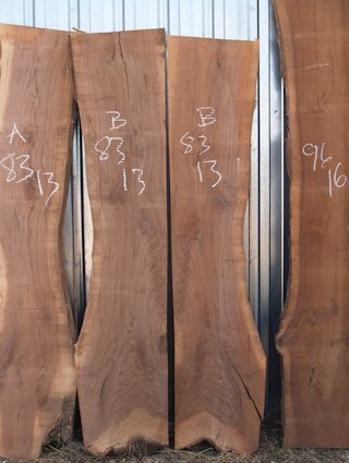 Walnut slabs.  The left slab, marked 'B 83 13', was used to make this bar top.