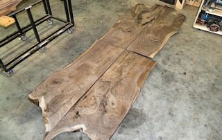 Book-matched Walnut slab pieces used to make a wood island top.