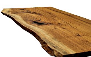 Island top constructed from one large Pecan slab.  This top has natural edges and a Tung-oil/Citrus finish.