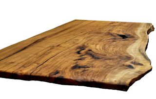 Island top constructed from one large Pecan slab.  This top has natural edges and a Tung-oil/Citrus finish.