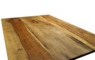 Custom island top constructed from Texas Pecan slabs. Softened edges and Tung-Oil/Citrus finish