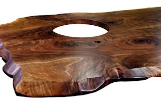 Custom Walnut island top from two book-matched slabs. Sculpted wane edges and Waterlox satin finish