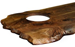 Custom Walnut island top from two book-matched slabs. Sculpted wane edges and Waterlox satin finish