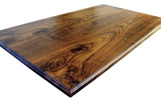Custom Walnut island top from two book-matched slabs. Ogee Fillet edge profile and Waterlox satin finish