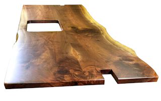 Custom Walnut island top from two book-matched slabs. Natural wane edges and Waterlox satin finish