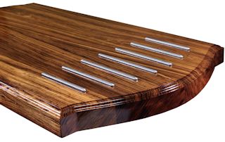 Zebrawood Island Top with Integrated Trivet made using Rounded Stainless Steel Bars.