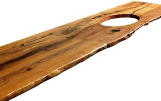 Mesquite wood countertop with Natural Edge on the front and a Waterlox Satin finish.