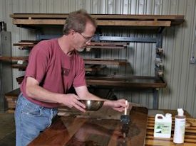 Applying our Tung-Oil Citrus solvent finish to the walnut island top