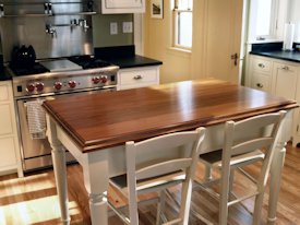 Afromosia edge grain custom wood table top.