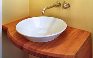 Edge Grain Cherry Vanity with vessel sink and Waterlox finish