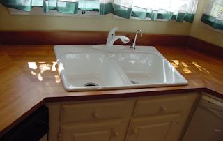 Edge Grain Cherry countertop with drop in sink and Waterlox finish