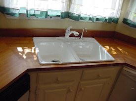 Edge Grain Cherry countertop with drop in sink and Waterlox finish