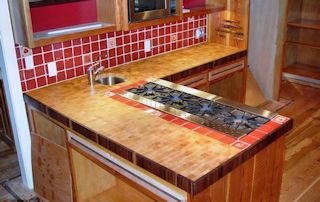 Butt-Joint on a Hard Maple Wood Countertop with Walnut Banding. End Grain Construction with Tung-Oil/Citrus finish