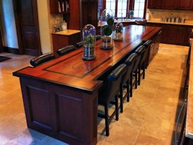 Jatoba face grain wood island countertop with wenge inlay and banding.