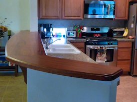 Jatoba face grain bar top with custom corbels.