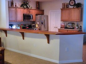 Jatoba face grain bar top with custom corbels.