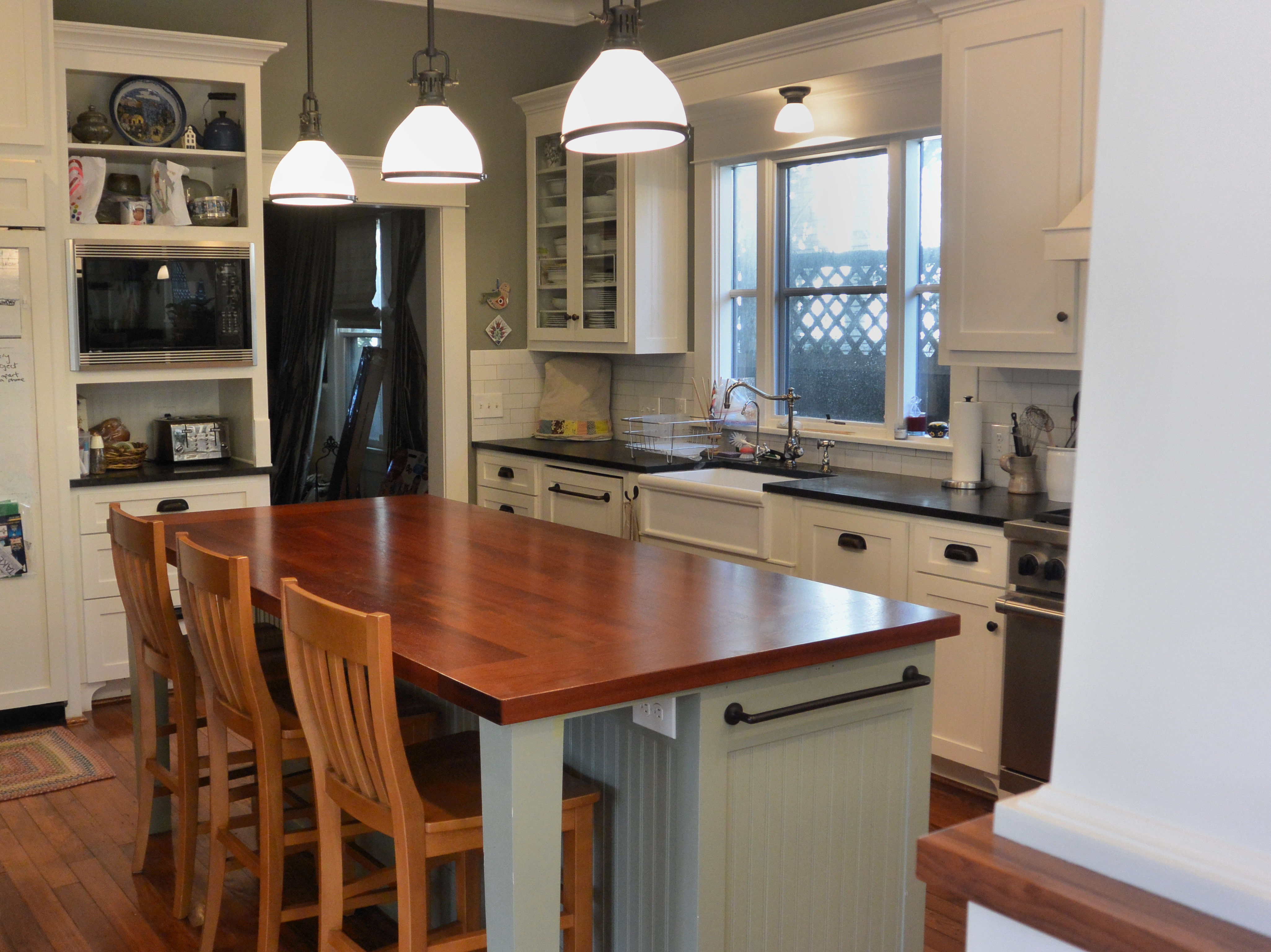 Jatoba face grain island countertop with breadboard ends and Waterlox Satin Finish.