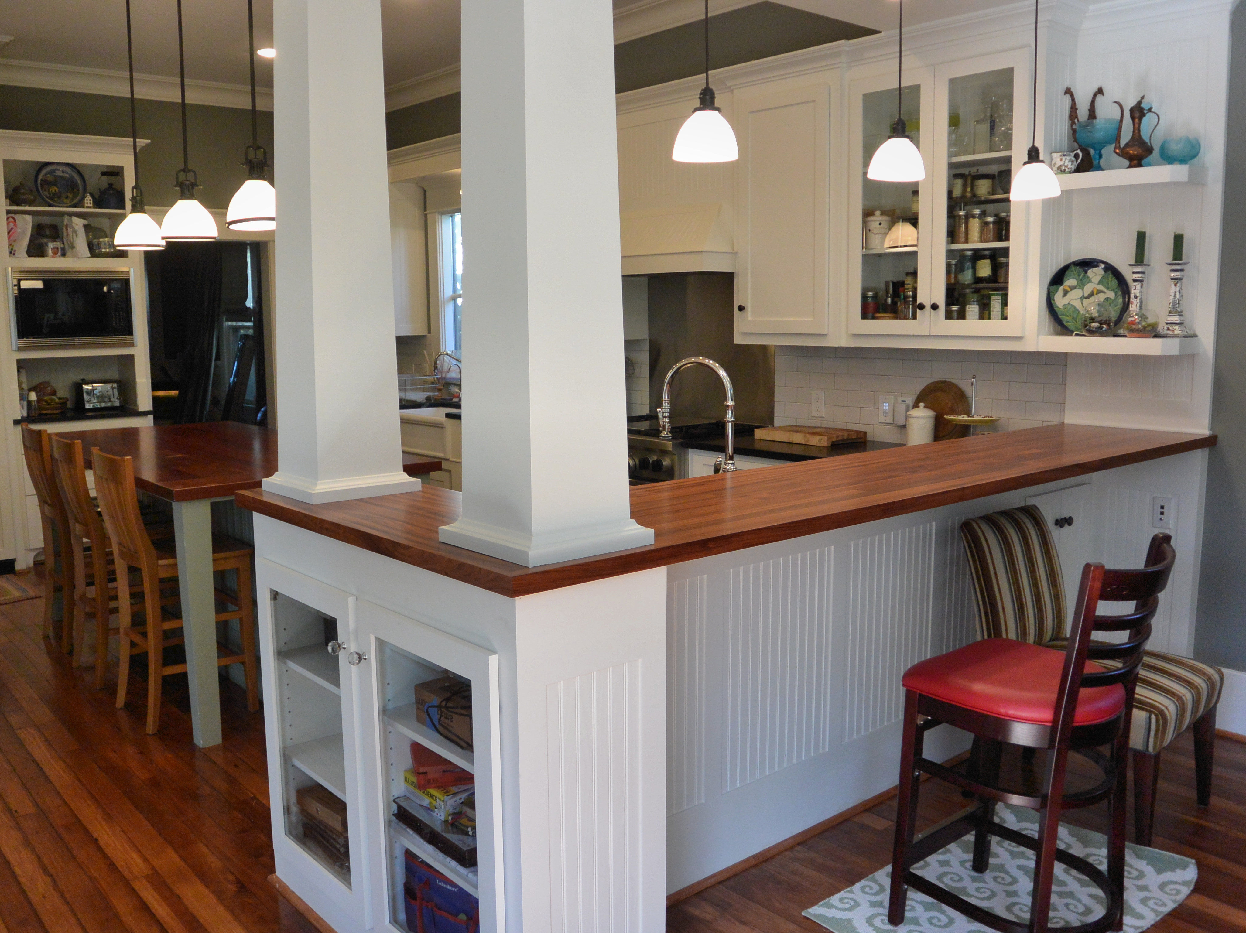 Jatoba edge grain bar top and face grain island top with Waterlox Satin Finish.