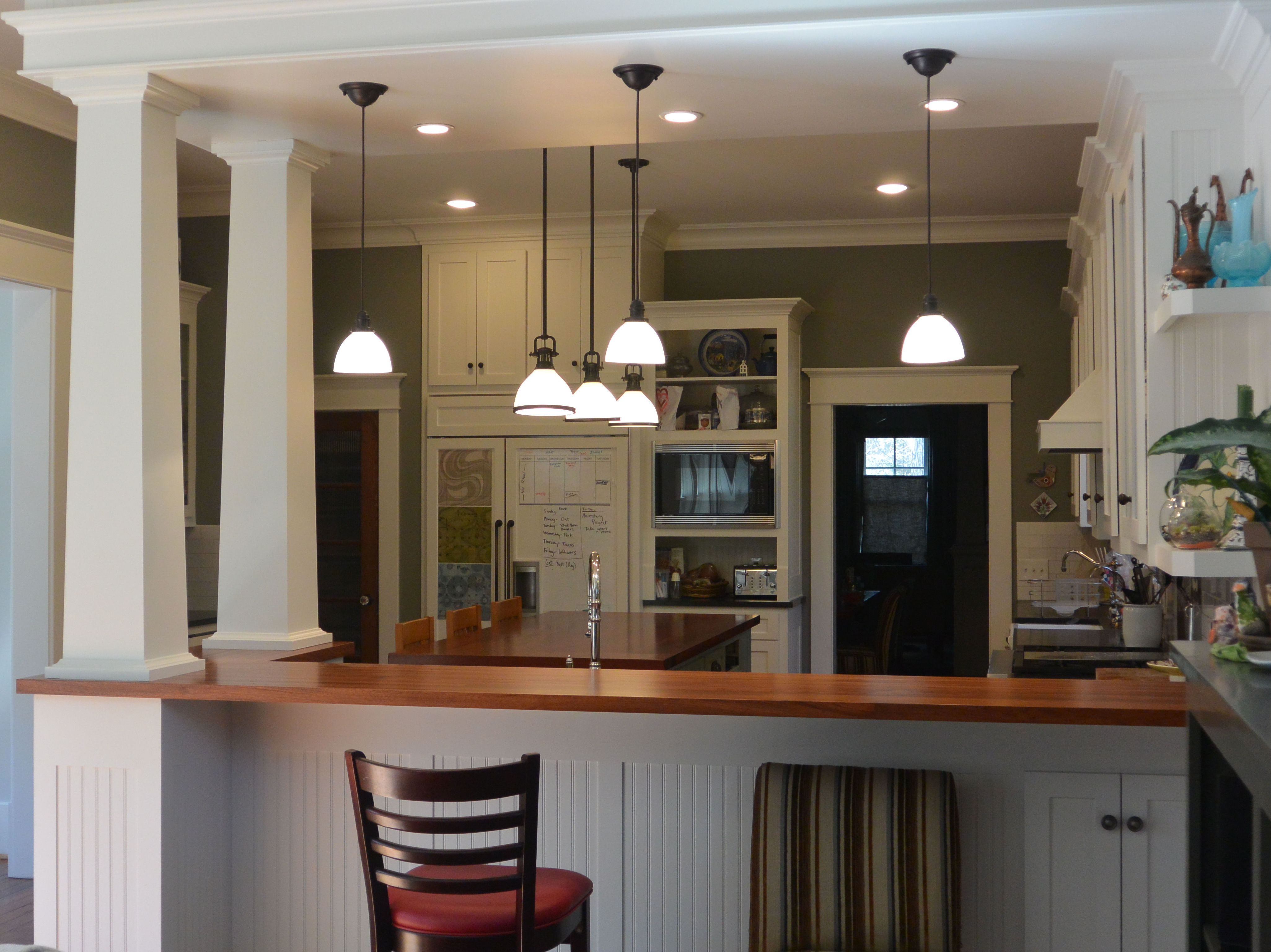 Jatoba edge grain bar top and face grain island top with Waterlox Satin Finish.