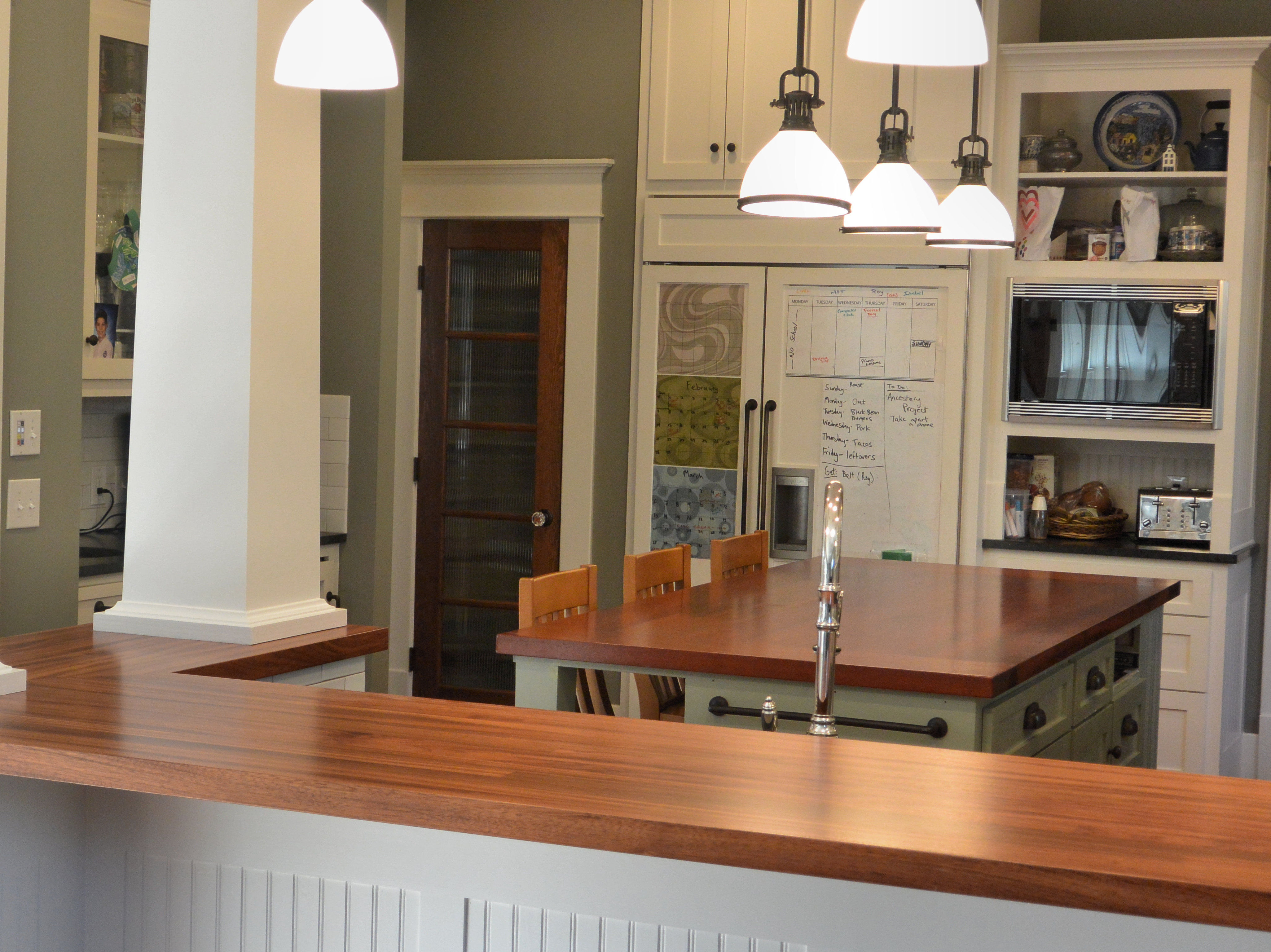 Jatoba edge grain bar top and face grain island top with Waterlox Satin Finish.