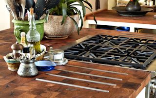 Mesquite Parquet-Style Island Top with Integrated Trivet using Stainless Steel Bars.