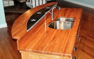 Custom Granite insert in an Edge Grain Mesquite Bar Top.