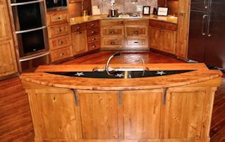 Custom Granite insert in an Edge Grain Mesquite Bar Top.