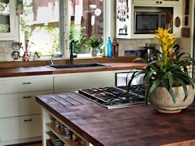 Mesquite parquet-style end grain wood island countertop.