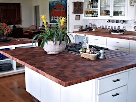 Mesquite parquet-style end grain wood island countertop.