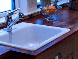 Edge Grain Mesquite Countertop with drop in sink and Waterlox finish