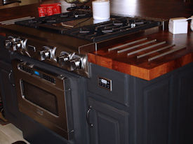 Mesquite parquet-style end grain island countertop with Stainless Steel Grids and Tung-oil finish. 