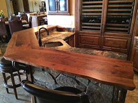 Mesquite face grain bar top with Waterlox Satin Finish.