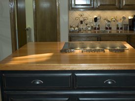 Pecan edge grain custom wood island countertop.