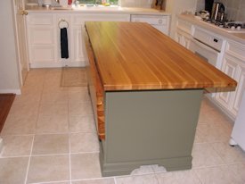 Pecan edge grain custom wood island countertop.