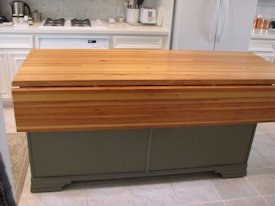 Pecan edge grain custom wood island countertop.